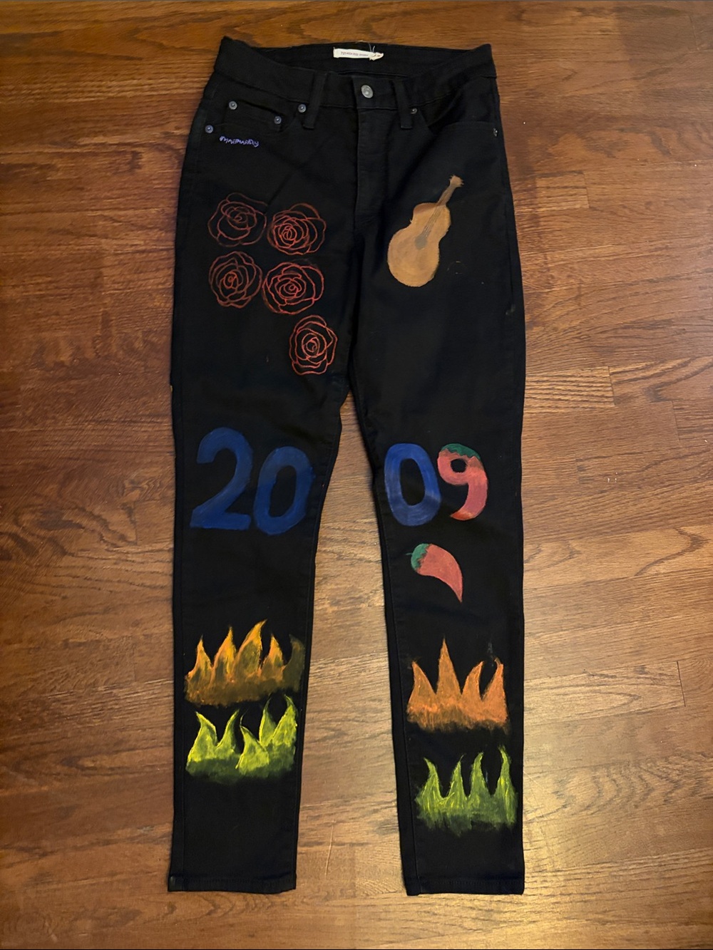 Hand-Painted and embroidered Black Skinny Jeans with Colorful Graphic Accents